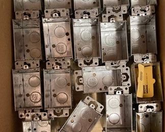 Boxes of Metal Wall Electrical switch and outlet boxes.