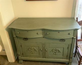 Multi drawer and door buffet in green antique color. 