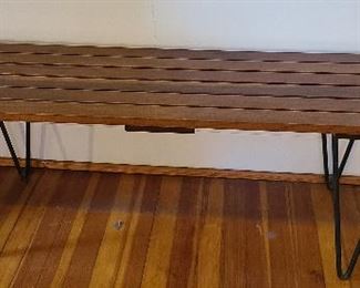Mid-Century Modern Slat Wood & Iron Bench

Designed by Fritz Bauder of Richmond Virginia.  Slat wood top with iron legs.  60" x 14" x 17.5"
