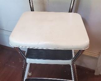 Vintage metal stool that converts to a step stool.
Good condition
34" tall
