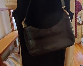 Vintage black sheath dress and purse.
Good condition
 Preview for size and further details. Most of the women's clothing is 8-12