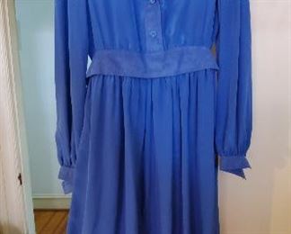 
Nice vintage women's dress with blue suede trim.  Good shape.
 Preview for size and further details. Most of the women's clothing is 8-12
