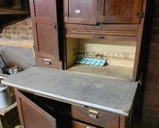 
Antique 1930's Wood Hoosier Cabinet

Located in basement.  Needs some TLC.  Measures 71" x 42"

Preview for full condition
