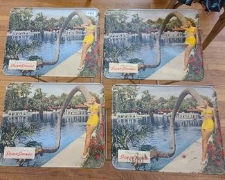 4 TV trays, unused from the 1950's.  Metal with woman from Silversprings Florida.  2 of them have marks on them from where paper stuck to them during storage.  Others are in unsused condition.  Preview for full condition and details.    Included with the TV trays is a hand colored photo of a boat tour from the Plaza Hotel, FLorida, also vintage.  