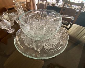 Glass Punch Bowl with matching Punch Cups and liner/tray.  The ladle is glass, too!