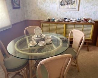 Rattan Dining Table and Chairs.  Table with Glass Top
