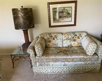 Vintage Sofa -1 of 2, Artwork, Vintage Table Lamp, 2 of 2 Rattan look Side Tables.  Note:  Table lamp is carved wood! Nice!
