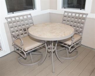 Round Tile Patio Table With Two Swivel Chairs