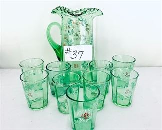 Vaseline uranium set 
9 glasses 1 pitcher. $65