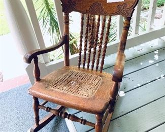 Antique small rocker.   Small brake in cane seat.  14 w 27 t 12” seat height 
$45