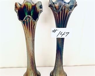 Purple vases looks like carnival glass. 
17”t.   Pair $55