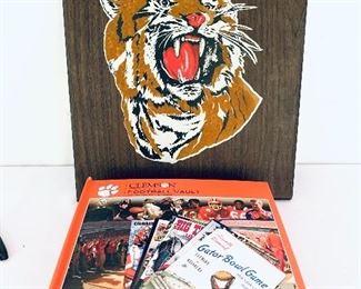 Book “Clemson Vault” one ripped page. 
Vintage tiger plaque. 16w 19t. 
Lot $49