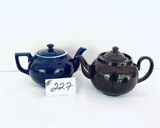 Tea pots 9” L.   $15 each. 
Blue tea pot is China 
