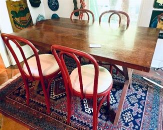 # 273- 600 FIRM Reclaimed heart pine table/desk 1950s ! Wood from the old confederate printing plant on Geravis St. Columbia. RED CHAIRS ARE NFS!  54L 33W 30T   
$700 FIRM
