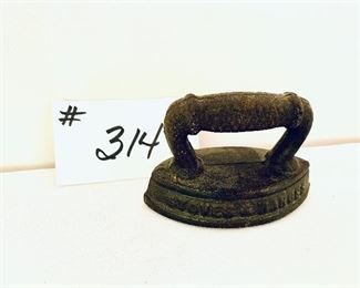 Miniature display iron. 
4”L. $14 FIRM
