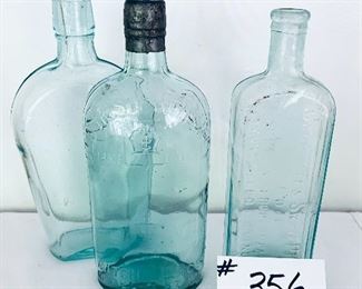 Set of three bottles 9 inches tall $37