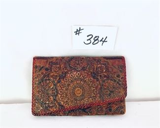 Italian leather embossed clutch purse eight wide five tall $65