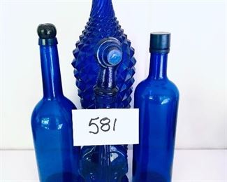 4 cobalt bottles. 12-16@ tall 
See next photo for damage. 
Lot $ 30