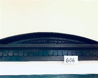 # 606 A
Wooden pediment 41 inches long 7 inches tall $99
