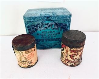 # 628
Three vintage snuff and tobacco tins  2 to 4 inches tall $40