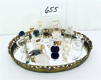 Vanity mirror and 12 perfume bottles $42