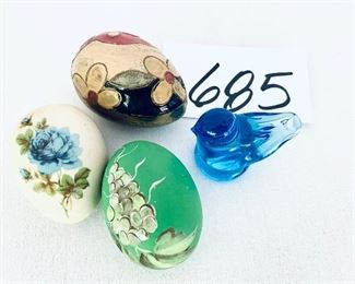 Signed bluebird and three eggs lots $42
Eggs two painted one brass
