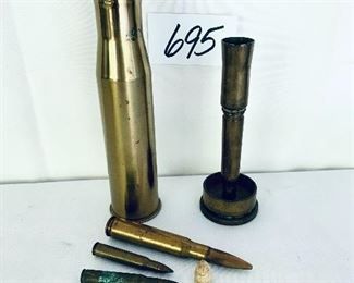 World War II military shells and trench art one Civil War bullet 
Lot $75 