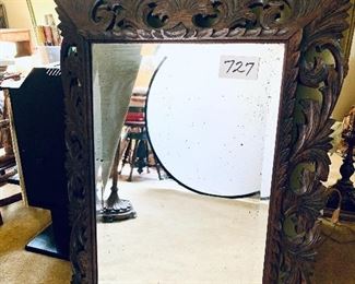 Antique carved wood beveled mirror
30 inches wide 47 inches tall $425