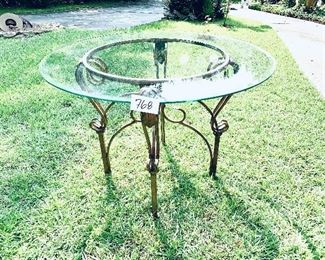 Metal table with beveled glass top. 
42w 30t  $195 FIRM