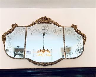 # 780. Antique etched mirror. 
62” Long. 38” T 
$850