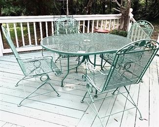 Vintage metal patio set with 4 spring chairs
table 42 wide 53 long seat height on chairs is 16 inches tall $300 FIRM