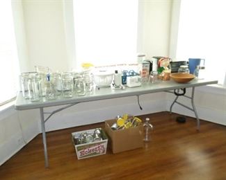 Glass storage and canning jars; toaster oven; popcorn popper; salad spinner.