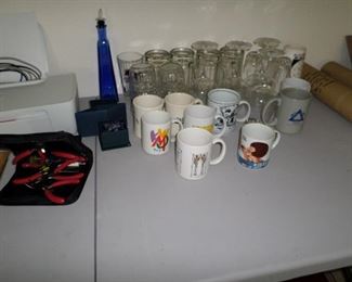 Cups and glasses, small tool kit.