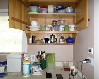 Storage containers and kitchen utensils; French press, teapot.