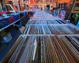 30,000 Vinyl Records FREE with any $20 purchase per person per hour. All Genres / All formats  