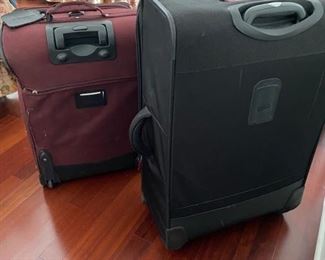 $40 Set of two luggage the black one is 31"T x 1'D