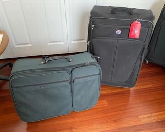 $40 Set of two luggage the black one is 31"T x 1'D
