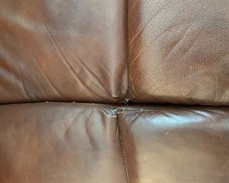 9- $250 Haverty's Three seats sofa with two recliners (pls see pics, could you a good leather cleaning)