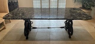 $1,100 - Italian or French style table Granite top and iron base 7'L x 42 1/4"W - Granite thickness 1" - located at different location, call for apt