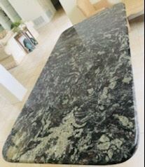 $1,100 - Italian or French style table Granite top and iron base 7'L x 42 1/4"W - Granite thickness 1" 