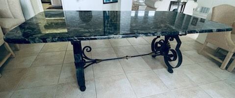 $1,100 - Italian or French style table Granite top and iron base 7'L x 42 1/4"W - Granite thickness 1" 