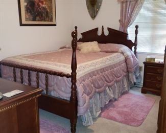 Queen size cherry finish bedroom set by Vaughn in exc.  Located in the Medieval themed bedroom. 