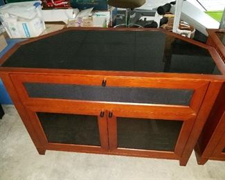 glass top TV/stereo console, angled back