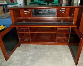 glass top TV/stereo console, angled back