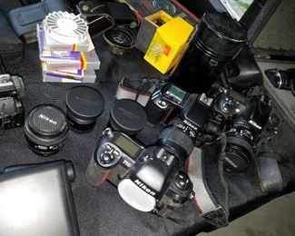 newer and vintage cameras, audio players, Nikon...