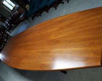 large dining or conference table, by Johnson Furniture Co. (originally purchased for $25,000)