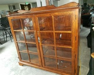 large display cabinet, with glass shelves and interior lights, by Lane