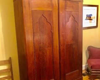 Fabulous Classical/Empire Mahogany Armoire with Gothic Paneled Doors.
