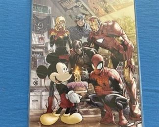 Marvel Comics #1000 - Walt Disney cover. EXTREMELY LOW PRINT RUN given to ComicCon ticket holders. FIRST APPEARANCE of Mickey Mouse on a Marvel comic book cover. VERY RARE. This book is in NM condition and currently selling for over $2,000 on other sites. Prices continue to skyrocket on this book! Own a piece of history with this book!!!