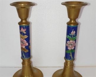 Lot Number:	63
Lead:	Pair of Brass & Porcelain Candlesticks
Description:	porcelain with blue background and pink flower 8" tall; 3.25" diameter base
